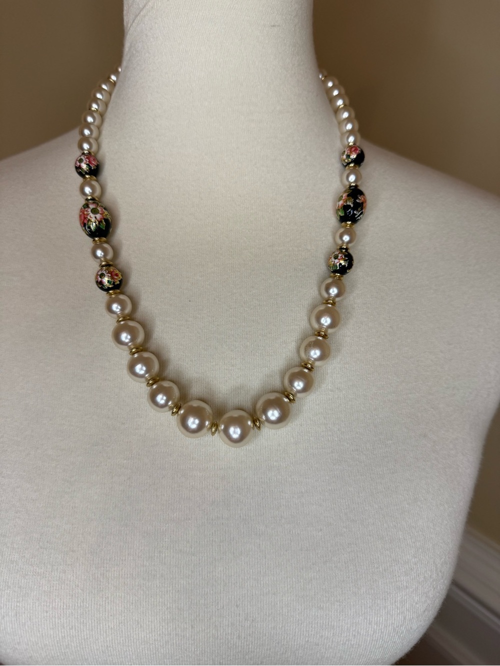 Elegant Ivory Pearl Necklace with Black Floral Accents